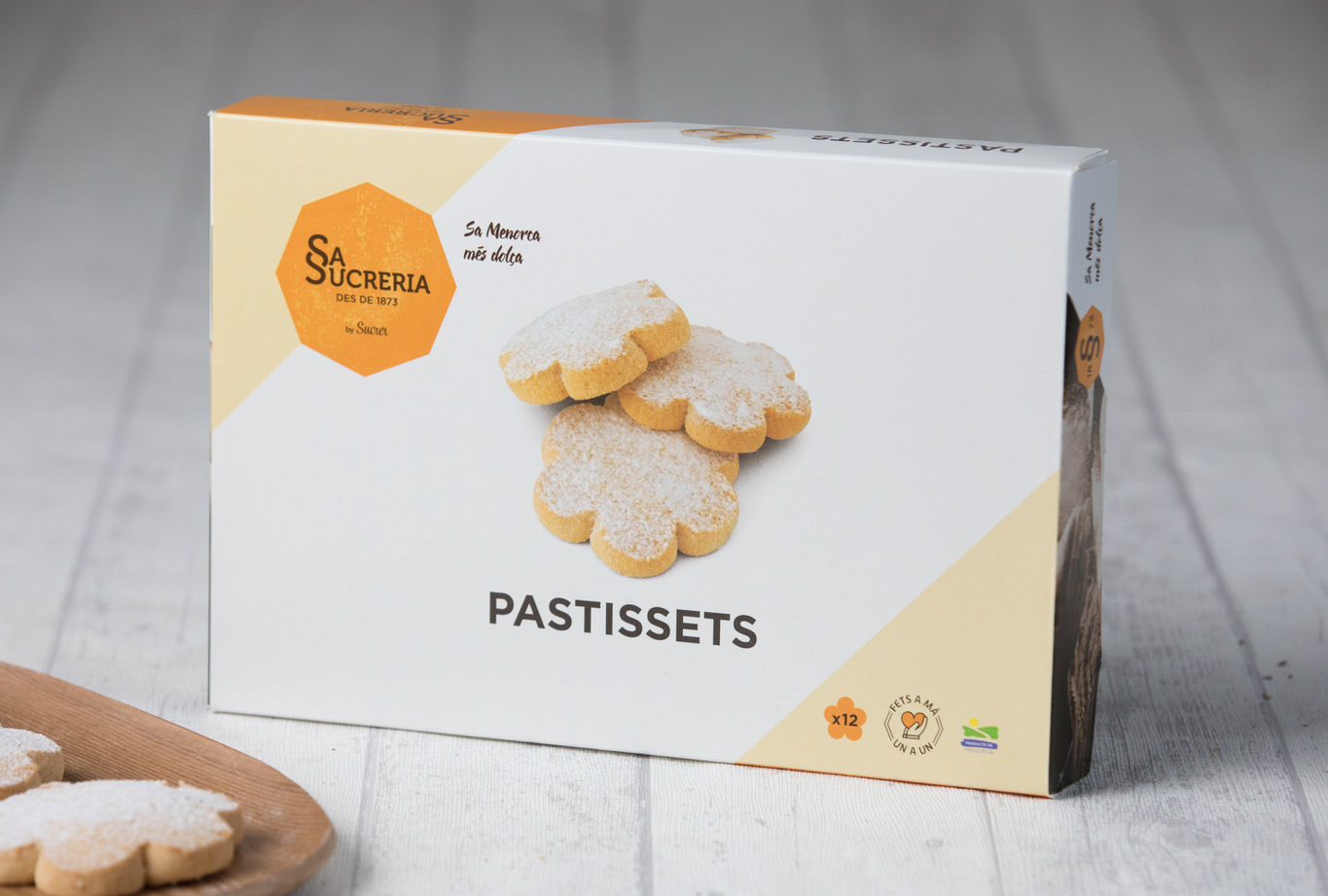 estudio de diseño de packaging alimentario para los postres tradicionales de Sa Sucreria - Caja Pastisset 12 unidades